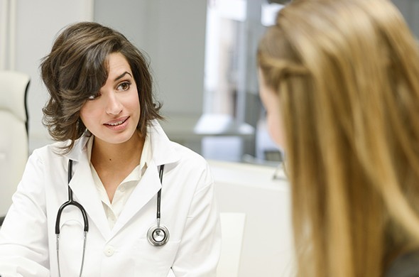 doctor talking to patient